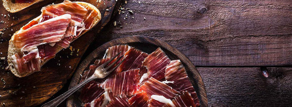 Serrano Schinken online - Online-Shop Gastronomic Spain - Serrano Schinken schneiden